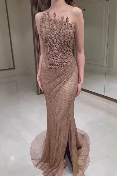 Woman wearing a beaded evening gown with a high slit, glitter sparkling diamonds, straight across, mermaid, train, old-money classy elegant dubai style, saudi arabic, sleeveless, elliesaab, prom, wedding guest, bridesmaid, mother of the bride, christmas, luxury, celebrity, expensive cheap, vintage, real photos, high-end, chooseone, viral, where to buy, now, shop, store, miss universe, best, number one top, glamorous, sexy, simple, haul, shein, dance, formal, give me jane lee, beige, champagne nude skincream